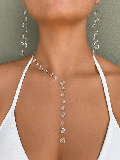 Elegant transparent droplet necklace styled for a special occasion